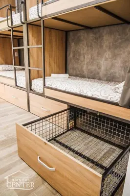 a room with three bunk beds in it at Hostel Center in Ulcinj