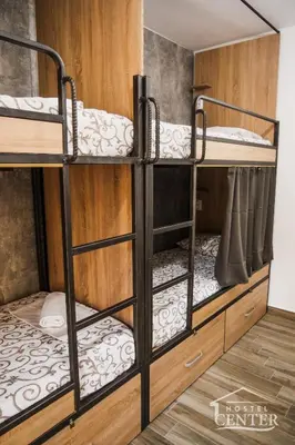 a couple of bunk beds in a room at Hostel Center in Ulcinj