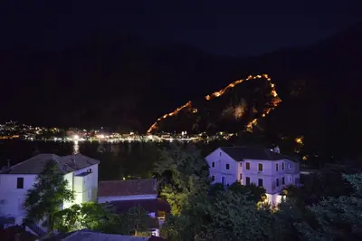 a view of a mountain at night at Posto Capitano C Group in Kotor