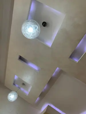 an overhead view of a ceiling with lights at Apartment Seaview Budva in Budva
