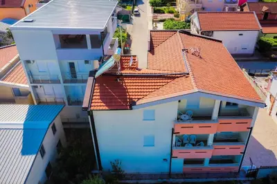 an overhead view of a house with orange roof at Apartments Leyla in Ulcinj