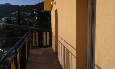 a balcony of a building with a view at Apartman Marinkovic in Dobra Voda