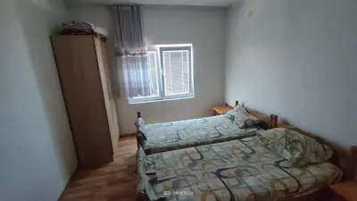 a bedroom with a bed and a window at Apartment Panorama Vista 72 in Bar