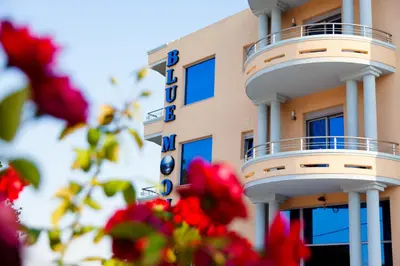 a building with a sign that says hotel at Hotel Blue Moon in Ulcinj