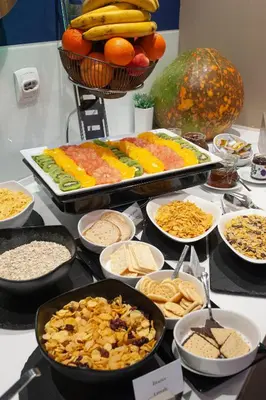 a buffet of different types of food on a table at voco - Podgorica by IHG in Podgorica