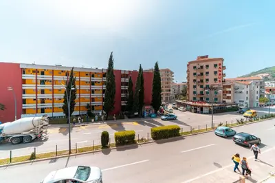 a view of a city street with cars and buildings at SMS Apartments in Budva