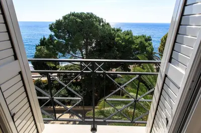 a view of the ocean from a balcony at LuxBeachFront in Petrovac na Moru