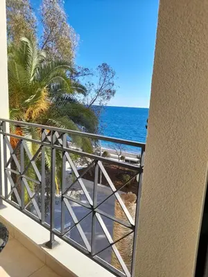 a balcony with a view of the ocean at LuxBeachFront in Petrovac na Moru