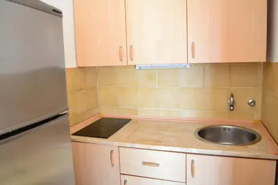 a kitchen with a sink and a counter top at Apartment Matea in Petrovac na Moru
