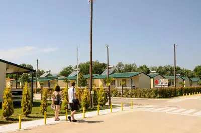 two people walking down a street at MCM Camping in Ulcinj
