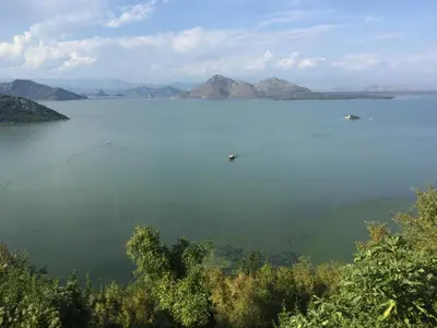 a large body of water with two boats in it at Room 4 U in Bar