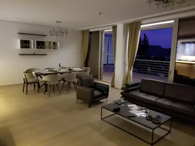 a living room with a couch and a table at Duklej Apartment LUX in Budva