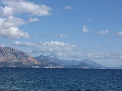 a large body of water with mountains in the background at Star Home in Kotor