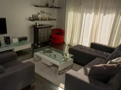 a living room with a couch and a coffee table at Lux Villa Ivan Budva in Budva