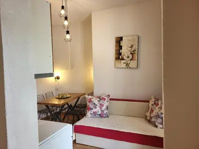 a living room with a couch and a table at Apartments Ardoni in Ulcinj