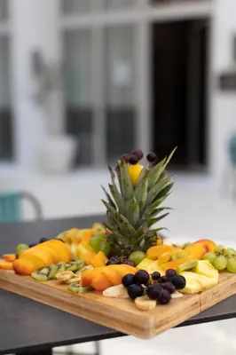 a tray of fruit on top of a table at Hotel Casa di Sofia in Budva