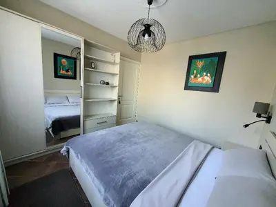 a bedroom with a bed and a mirror in it at Selena in Bar