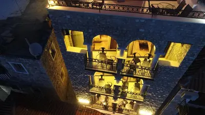 an overhead view of a building with balconies and lights at Apartments Timoni in Ulcinj
