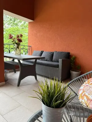 a living room with a couch and a table at Apartment Atina in Kotor