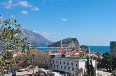 a view of a city and the ocean at Leona Residences Apartment in Budva