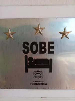 a sign for a soap dispenser with stars on it at Apartments Šofranac in Podgorica