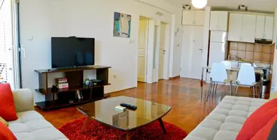 a living room with a couch and a coffee table at Old town Beauty Apartment with great view in Podgorica
