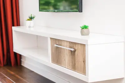 a white bathroom vanity with a white counter top at Apartments Antique in Ulcinj