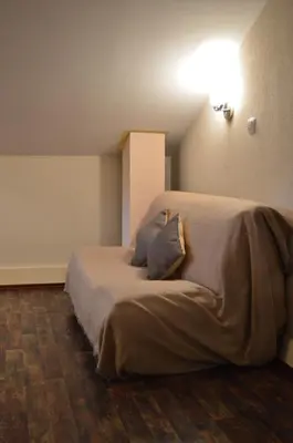 a bedroom with a large bed in a room at Apartments Qualitas in Kotor