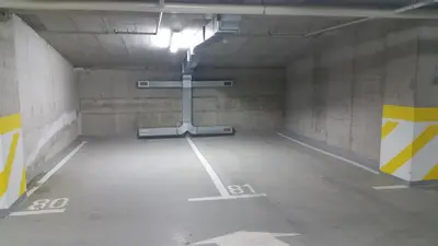 an empty parking garage with a light in it at Apartment SVS in Budva