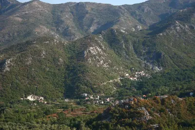 a small town in the middle of a mountain at Ivan's Holiday Home in Virpazar