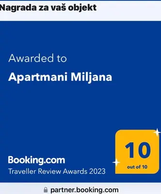a screenshot of theaniaza website with the text awarded to apartment minivan at Apartmani Miljana in Bar
