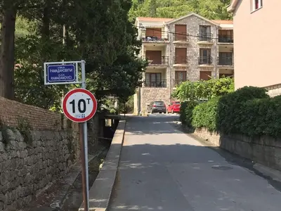 a speed limit sign on the side of a street at Villa 