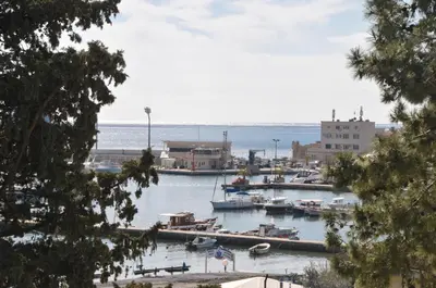 a group of boats docked in a harbor at Hotel Oaza in Budva