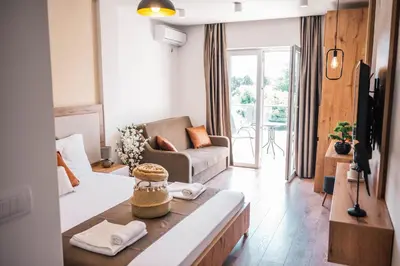 a living room with a couch and a table at Apartments Cungu in Ulcinj