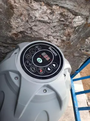 a close up of a device with a remote control at Holiday House Stari Volat in Budva