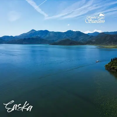 a view of a lake with mountains in the background at Apartmani Konoba Starčevo in Virpazar