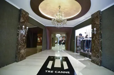 a tree game room with a chandelier and a tree game sign at Luxury Apartments Tre Canne Can in Budva