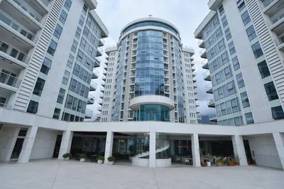 a view of a building with two tall buildings at Luxury Apartments Tre Canne Can in Budva
