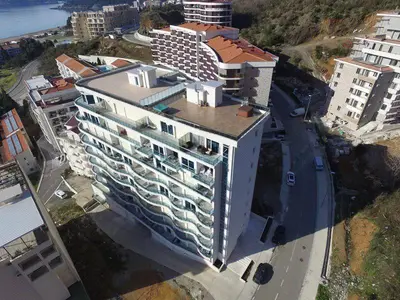 an overhead view of a large building in a city at Adriatic Sunshine Apartment in Budva