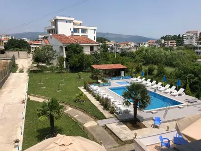 an aerial view of a resort with a swimming pool at Guest House Green Garden in Ulcinj