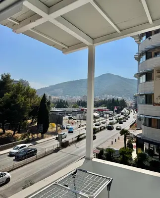 a view of a city from the balcony of a building at Apartmani Bulevar in Budva
