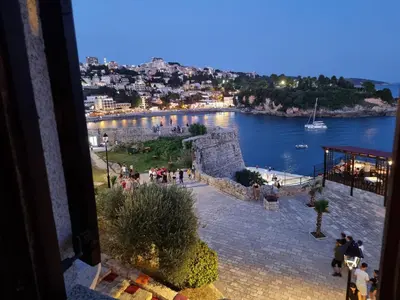 a view from a window of a city and a body of water at Kulla e Balshajve in Ulcinj