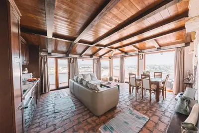 a living room with a couch and a table at Apartments Bazar in Ulcinj