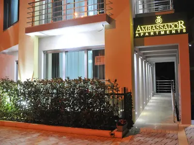 a building with a sign that reads ambassador apartments at Ambassador & Ambassador Lux Apartments in Ulcinj