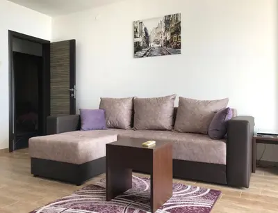 a living room with a couch and a table at Apartment Jana in Ulcinj