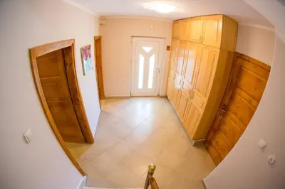 an overhead view of a hallway with a door at The Turtles Garden in Becici