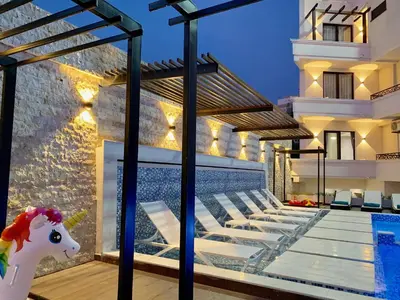 an image of a villa with a pool and a unicorn at Hotel Princess & Spa in Ulcinj