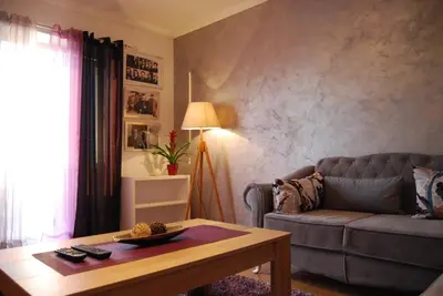a living room with a couch and a coffee table at Apartment Stanko in Pržno