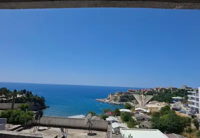 a view of the ocean from a building at Marko Apartments in Ulcinj