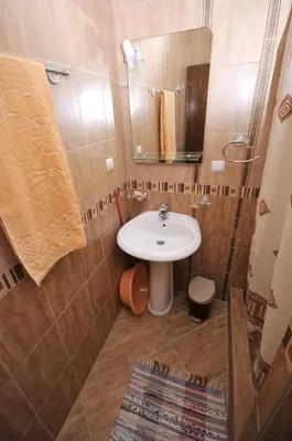a bathroom with a sink and a mirror at Marko Apartments in Ulcinj